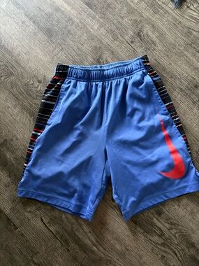 Nike Youth Boy’s Royal Blue Athletic Shorts with Red Swoosh